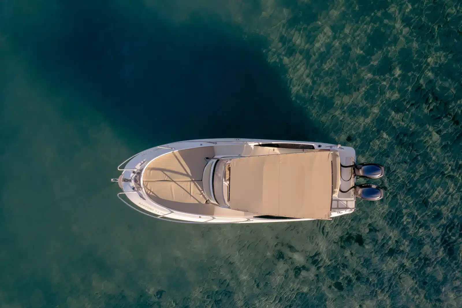 Private charter boat at anchor in a clear Zakynthos bay