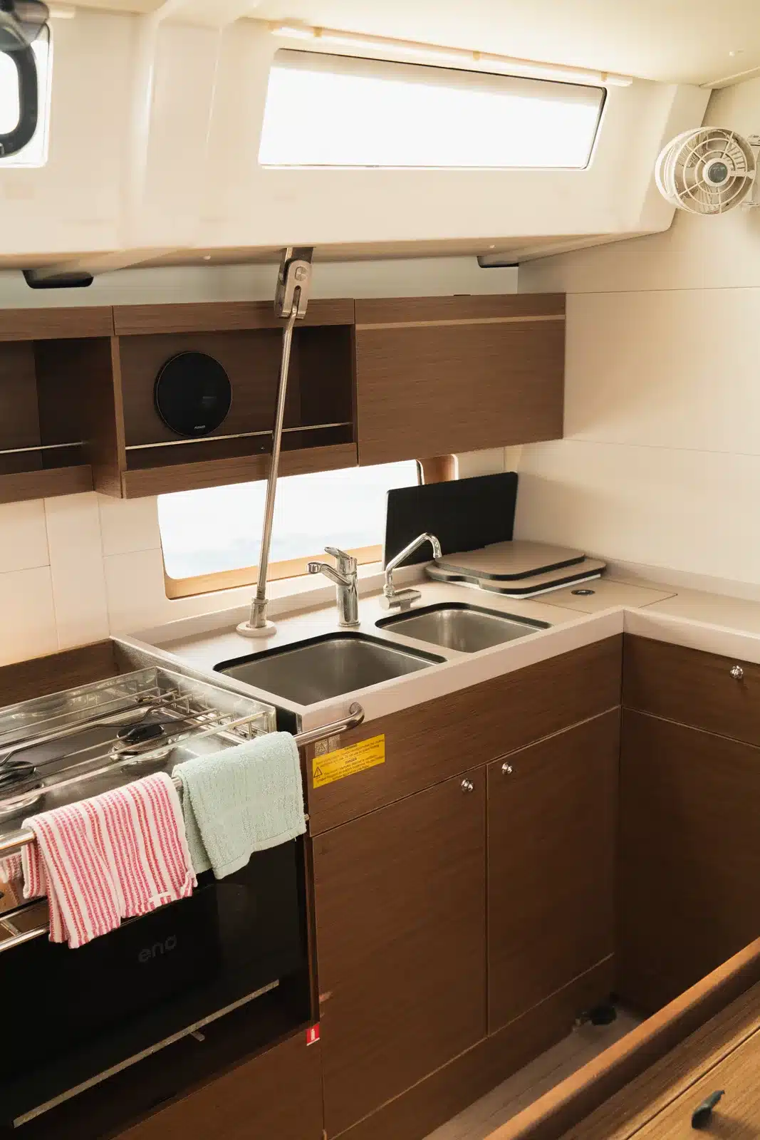 Boreas sailing yacht galley with modern wood interior