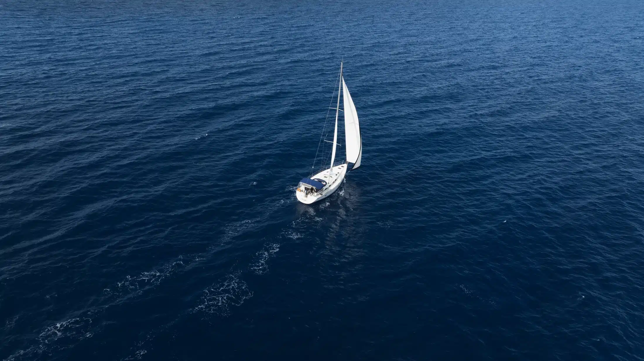 Aerial sailing scene with Ioneon Travel yachts off Zakynthos